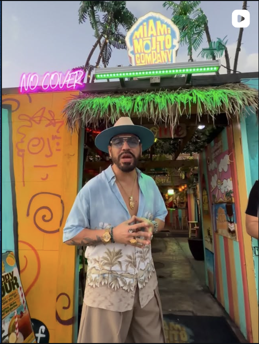 Carlos in straw hat at the Miami Mojito Company entrance